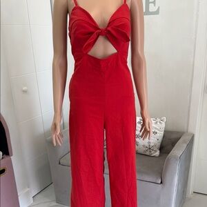 Chic Red Jumpsuit with Sleek Silhouette